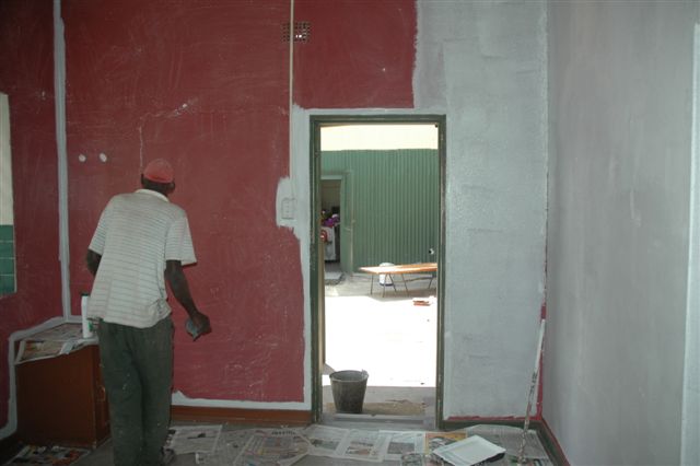 Almost gone, another 20 coats of paint and the dreaded colour will be smothered and ruled by a sparkling white shade. Note the old safe in the bottom left hand corner. A call to a locksmith could reveal the mysteries that may lie within!